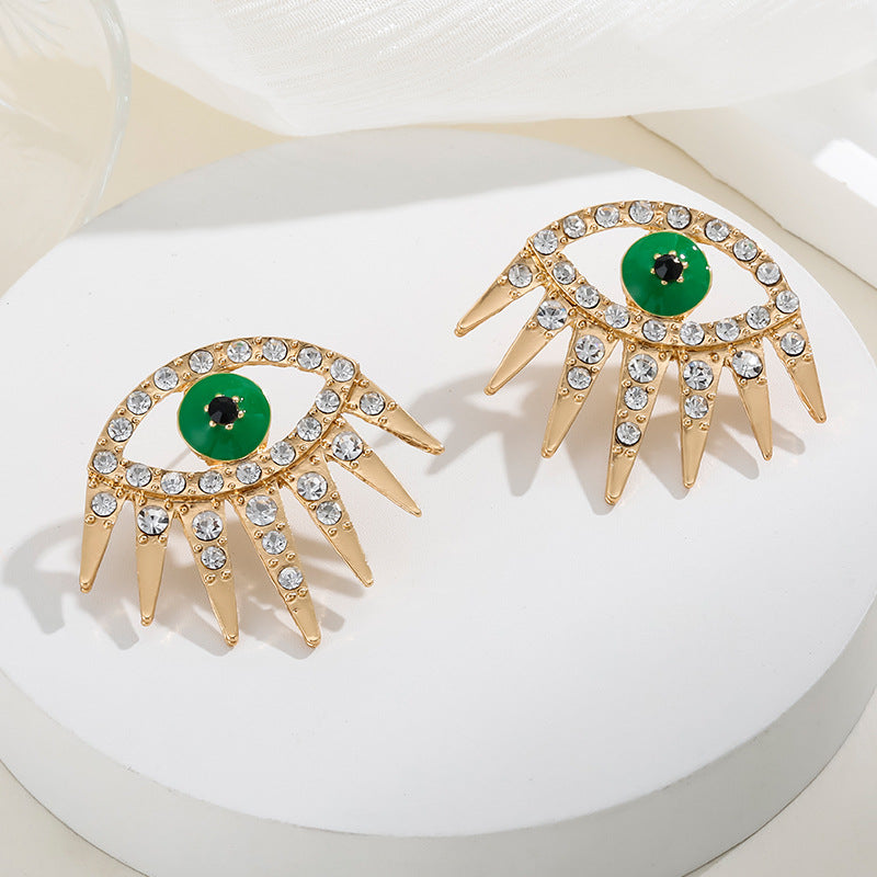 Alloy Gold Plated Diamond Dripping Devil's Eye Earrings